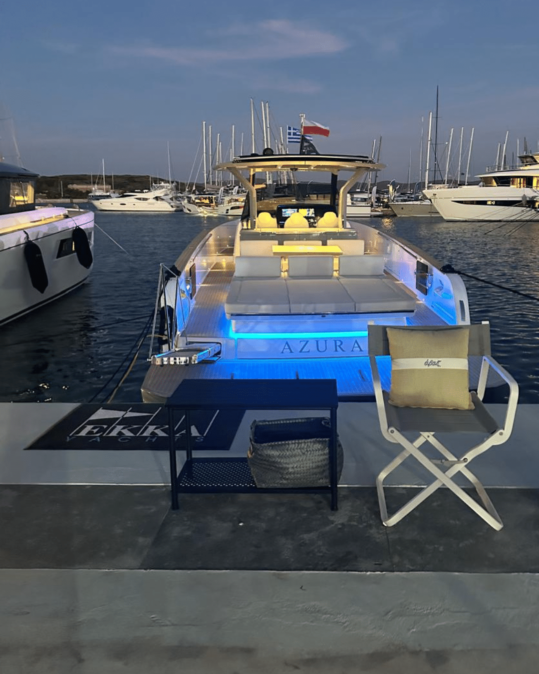 AVAX outdoor furniture beside a yacht at the Olympic Yacht Show 2026